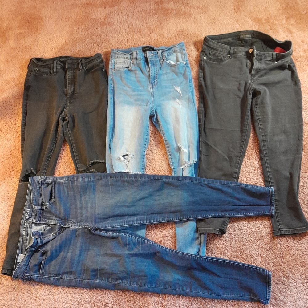 4 pairs of girls size 12 stretch jeans.